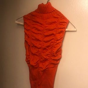 A ribbed turtle neck size large  sleeveless  🍊